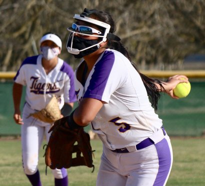 Lemoore's varsity softball pitcher, Leslie Segura, pitched in the Tigers' opener against Tulare Union on Lemoore's home turf.